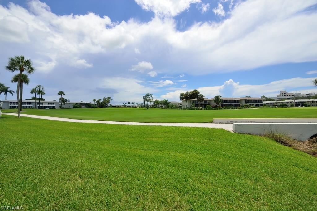 124 Penny Lane, Unit 778 Naples, FL 34112 - Photo 5 of 13 a view of a lake