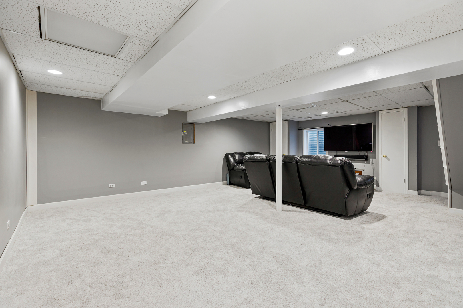 1467 Exeter Lane South Elgin, IL 60177 - Photo 19 of 29 a large room with furniture and a flat screen tv