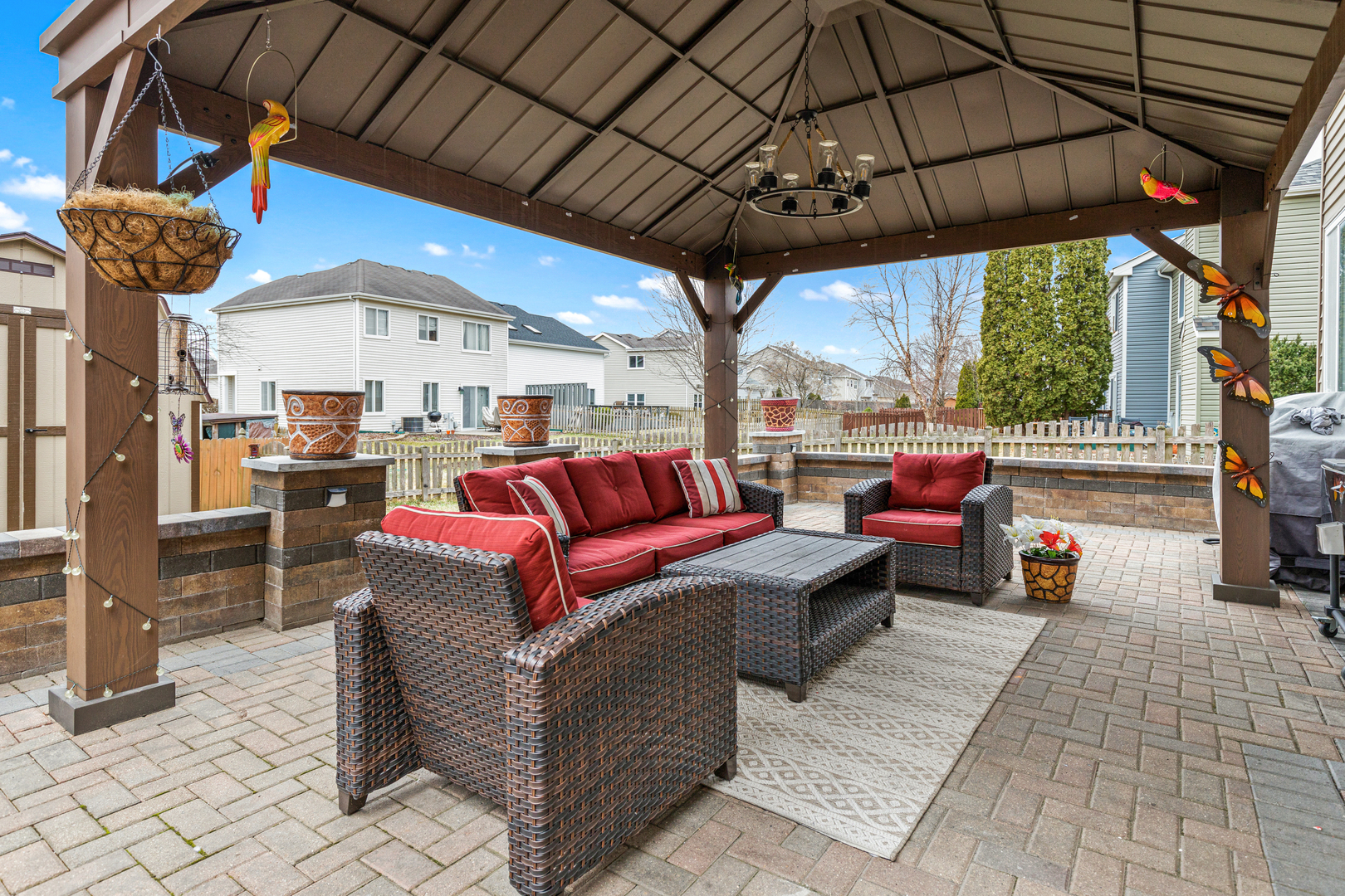1467 Exeter Lane South Elgin, IL 60177 - Photo 22 of 29 a outdoor space with patio the couches and a umbrella