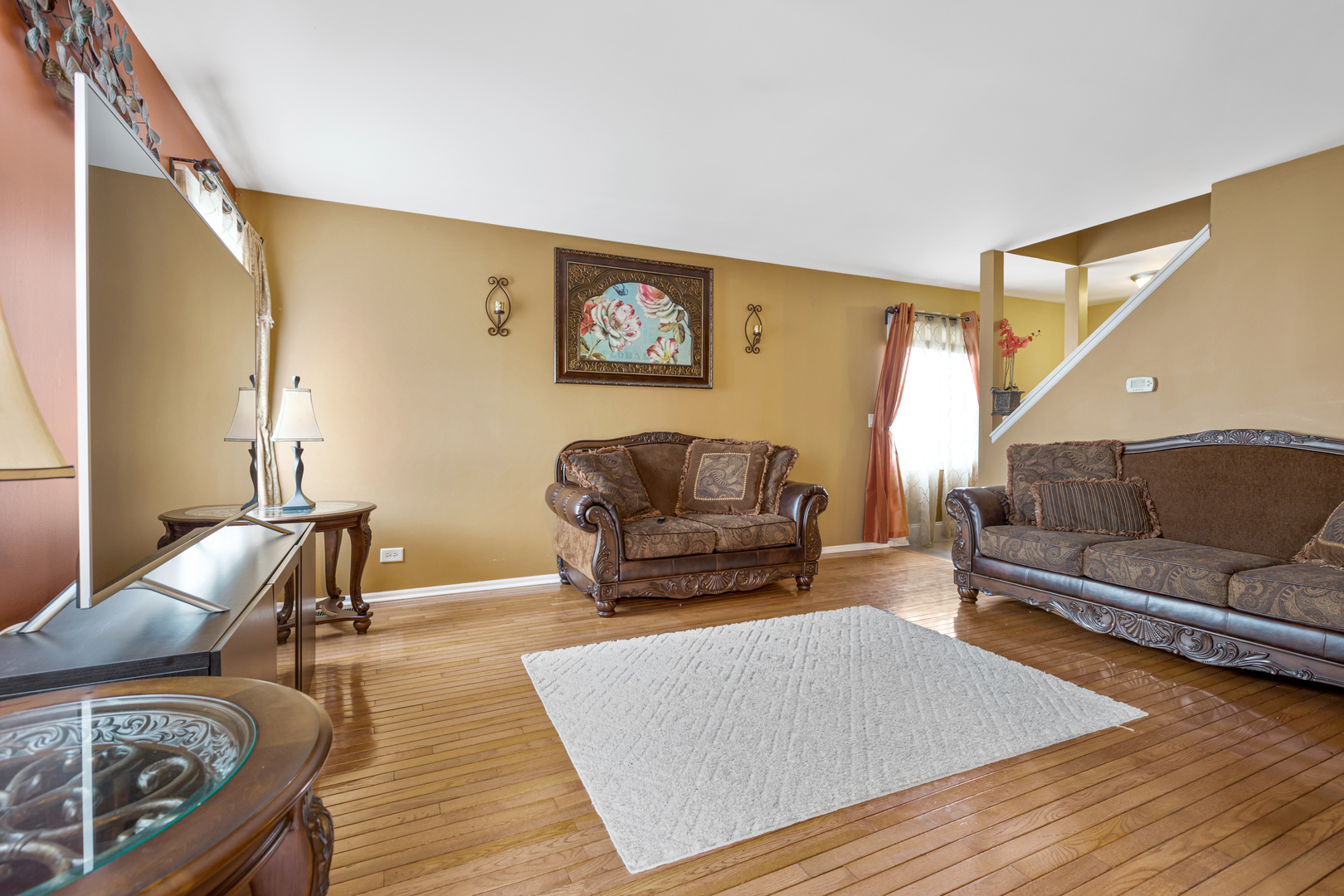 1467 Exeter Lane South Elgin, IL 60177 - Photo 4 of 29 a living room with furniture and a couch
