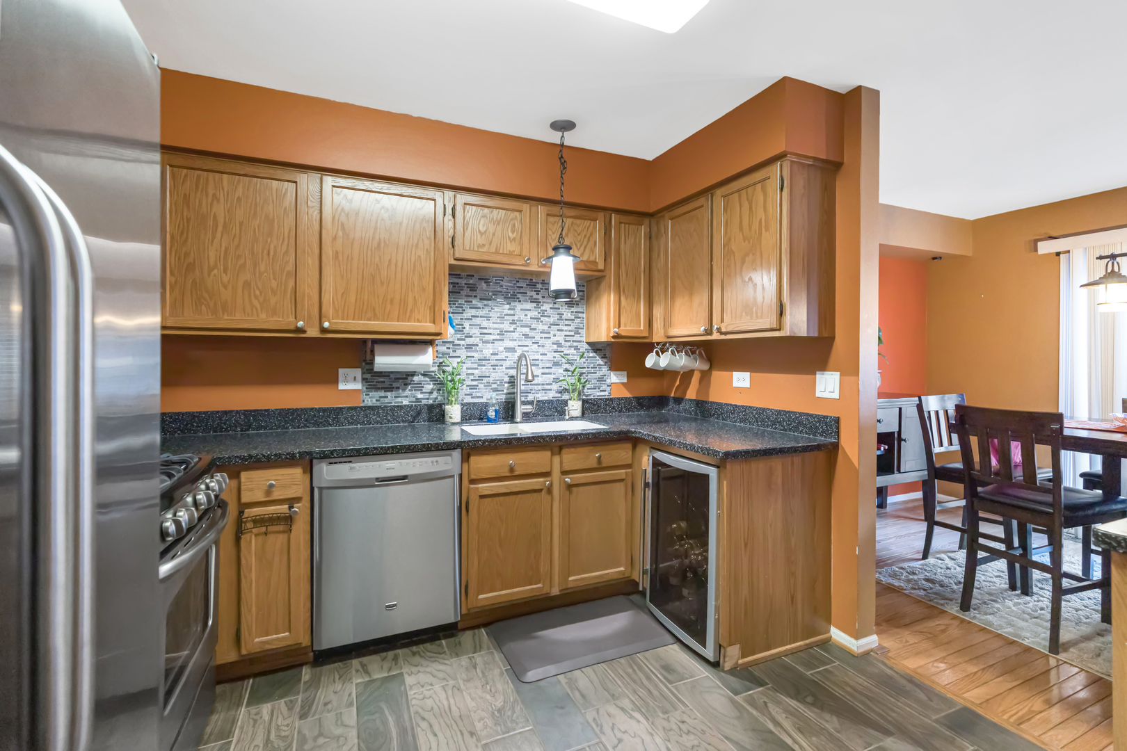 1467 Exeter Lane South Elgin, IL 60177 - Photo 9 of 29 a kitchen with stainless steel appliances granite countertop a sink and cabinets