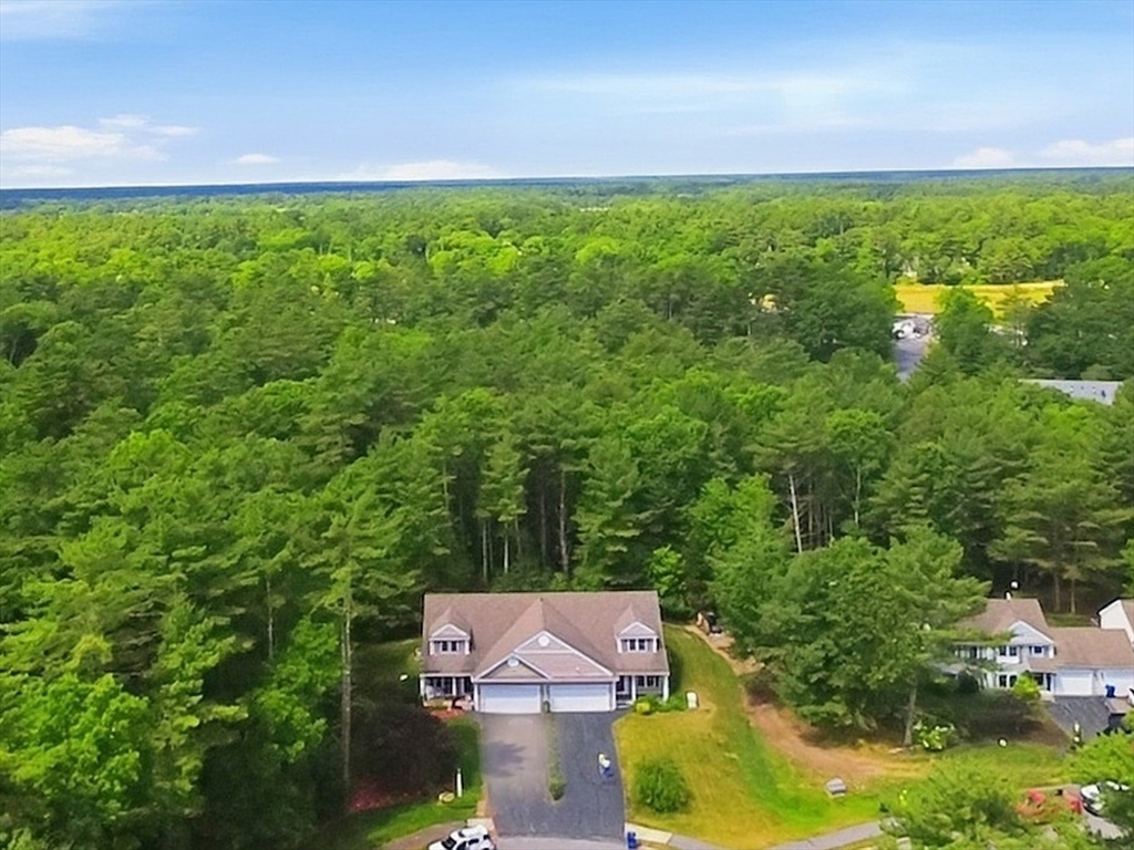 9 Rock Marsh Road, Unit B Wareham, MA 02571 - Photo 35 of 41 an aerial view of residential houses with outdoor space and trees