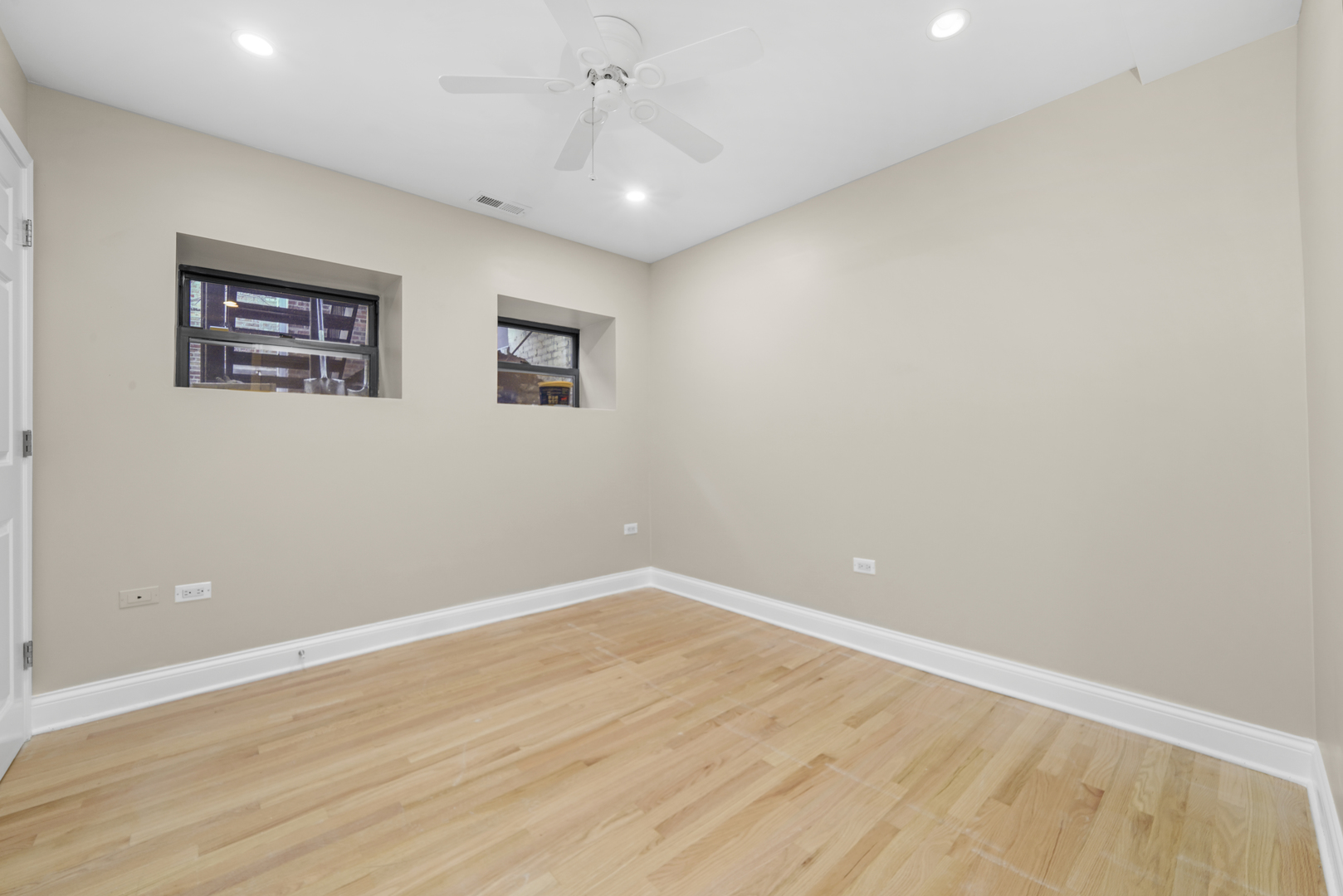 1640 West Ohio Street, Unit 1R Chicago, IL 60622 - Photo 10 of 13 a view of empty room with wooden floor