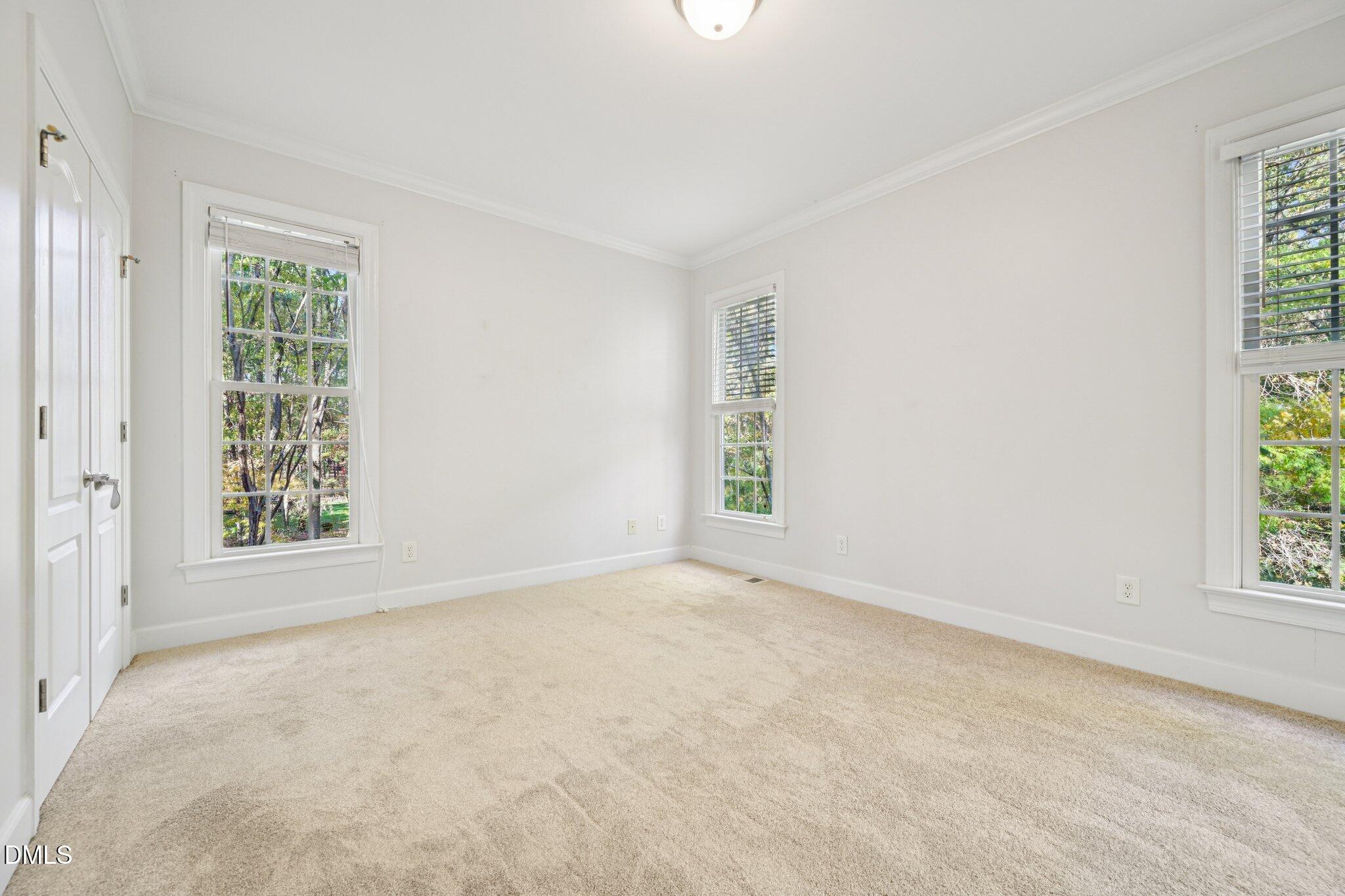 7628 Stony Hill Road Wake Forest, NC 27587 - Photo 25 of 33 an empty room with windows