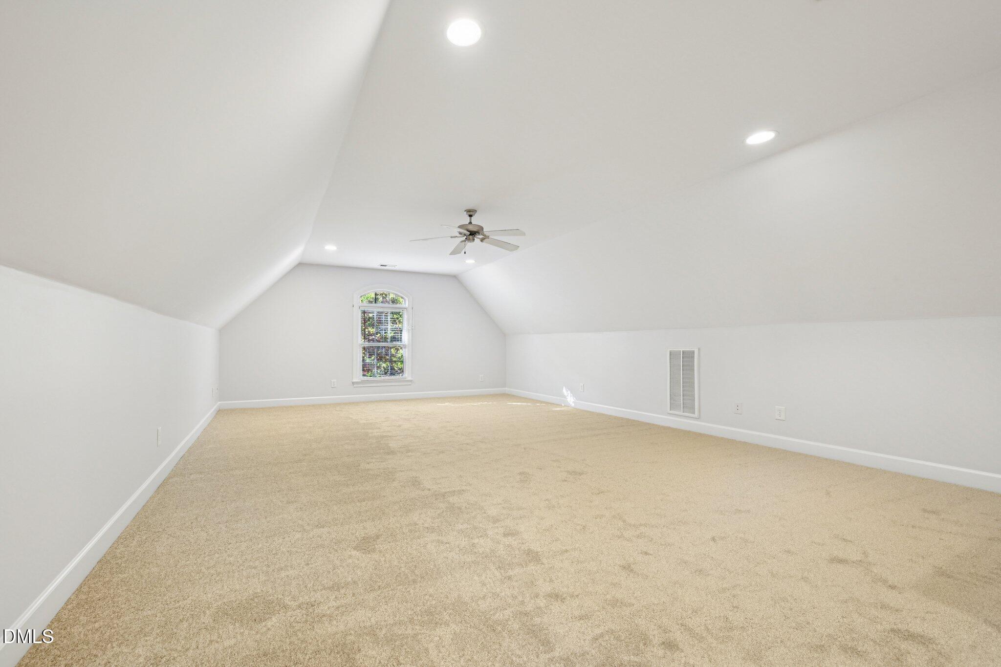 7628 Stony Hill Road Wake Forest, NC 27587 - Photo 26 of 33 an empty room with a natural light
