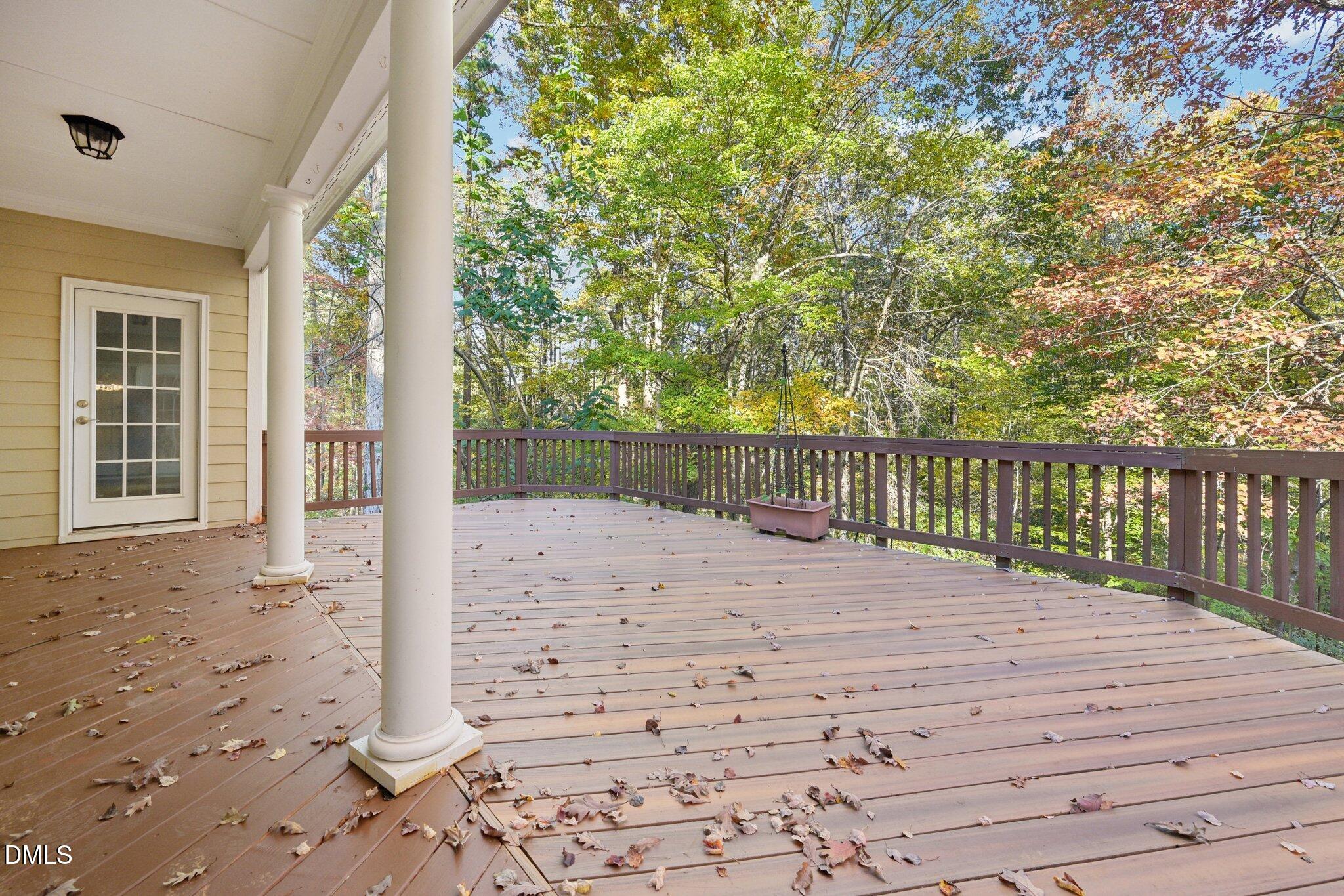 7628 Stony Hill Road Wake Forest, NC 27587 - Photo 29 of 33 a view of a backyard with wooden fence