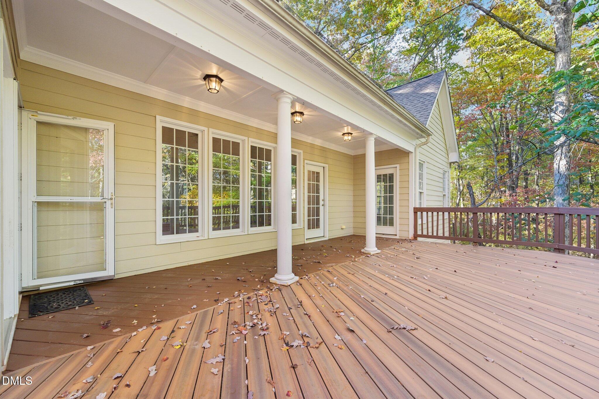 7628 Stony Hill Road Wake Forest, NC 27587 - Photo 31 of 33 a view of a house with wooden floor next to a yard