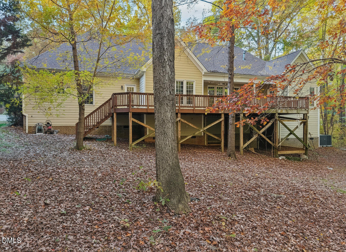 7628 Stony Hill Road Wake Forest, NC 27587 - Photo 32 of 33 a view of a house with backyard