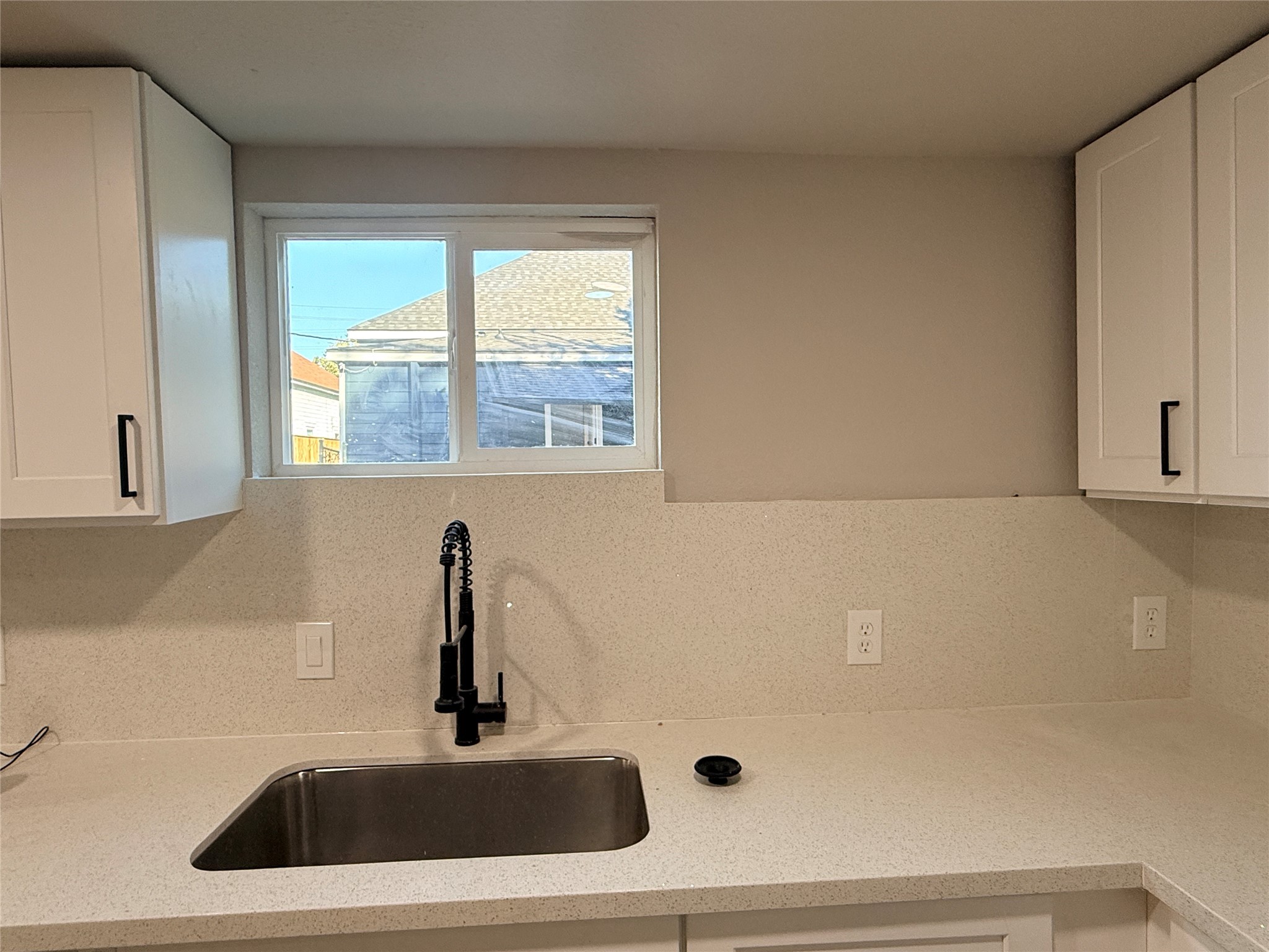 2209 Gano Street, Unit 3 Houston, TX 77009 - Photo 7 of 16 a bathroom with a sink and a window