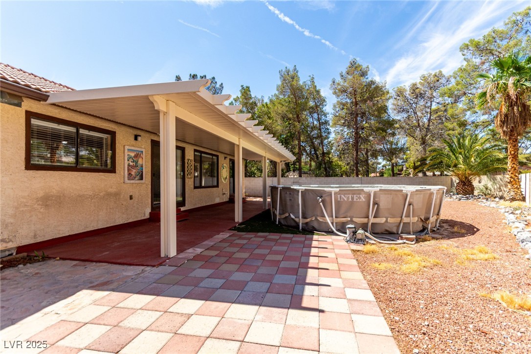 6465 West Plumcrest Road Las Vegas, NV 89108 - Photo 32 of 34 Fenced backyard with a patio area