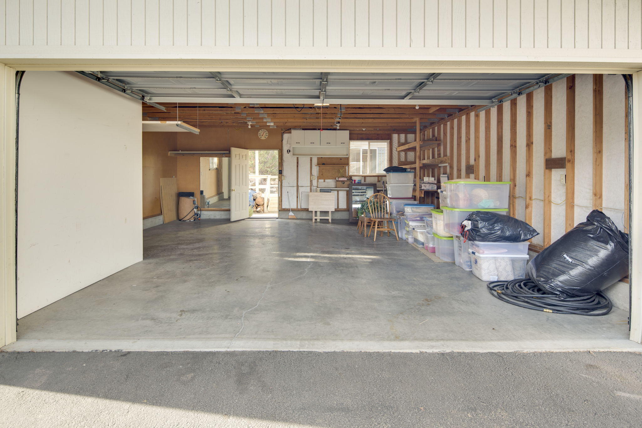9351 Southwest Shad Road Terrebonne, OR 97760 - Photo 26 of 37 Interior of large garage with extra storage room