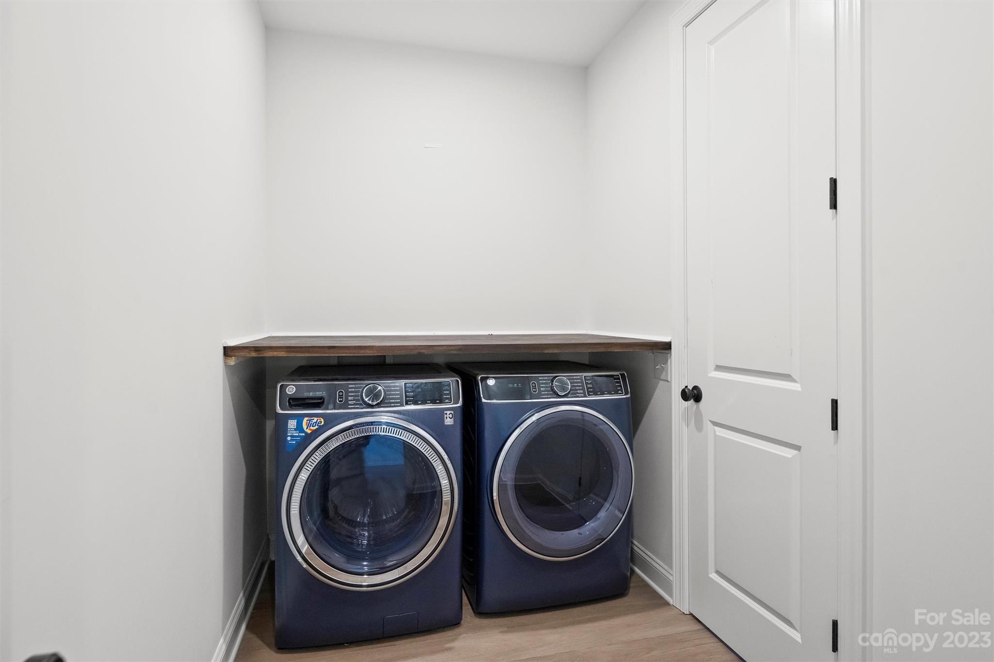 13228 Philip Michael Road Huntersville, NC 28078 - Photo 21 of 39 a utility room with dryer and washer