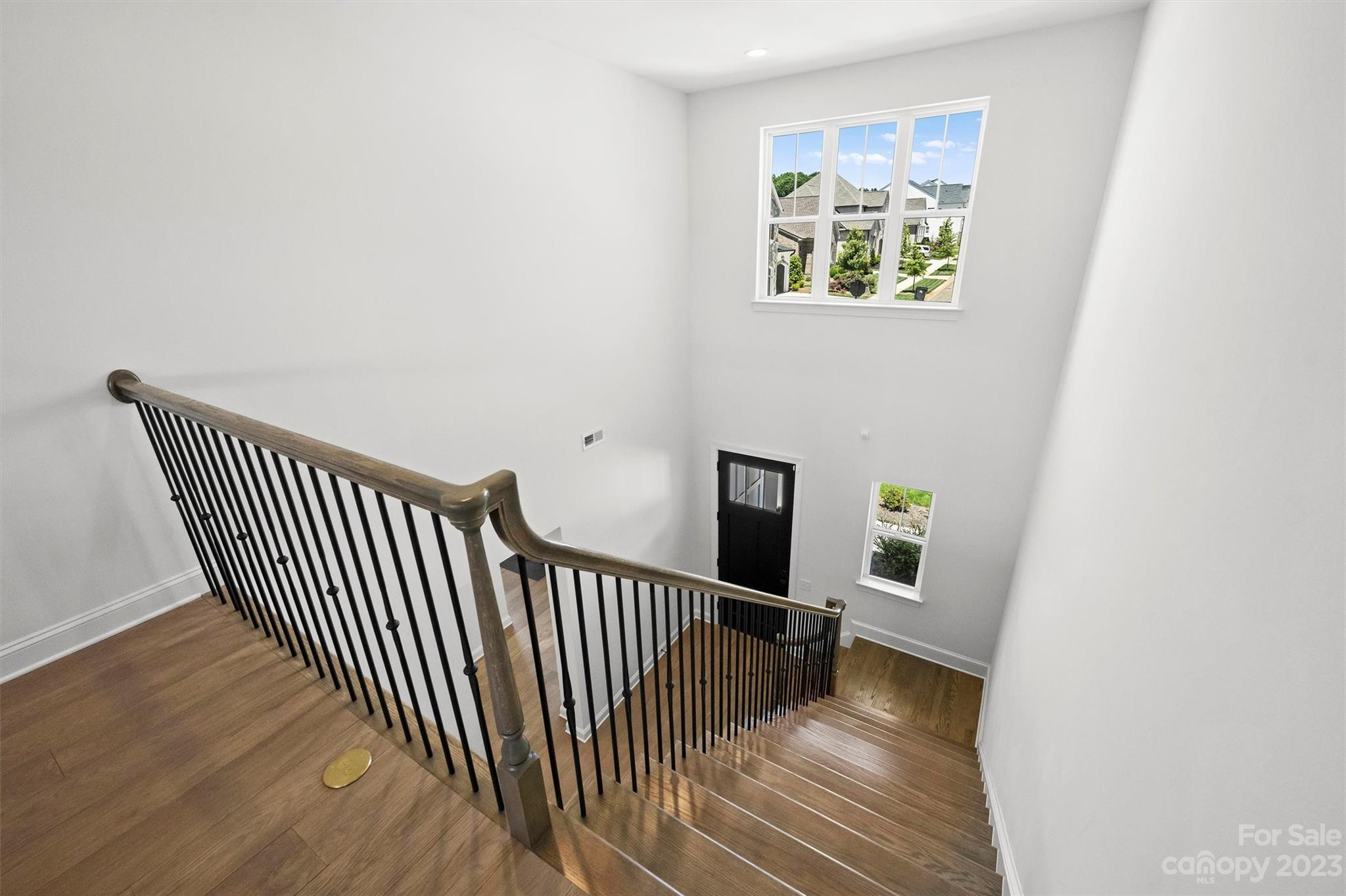 13228 Philip Michael Road Huntersville, NC 28078 - Photo 23 of 39 a view of entryway with wooden floor