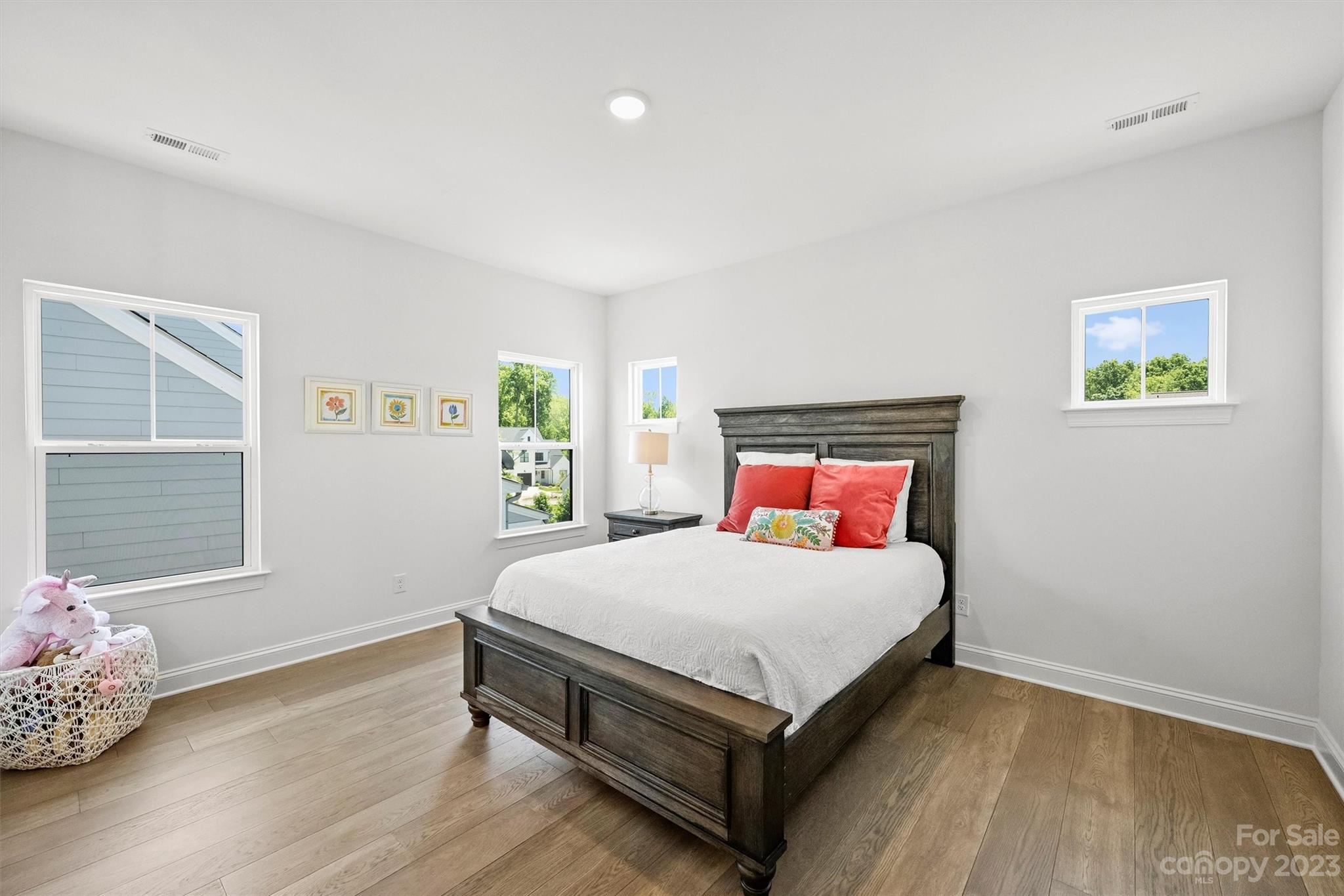 13228 Philip Michael Road Huntersville, NC 28078 - Photo 33 of 39 a bedroom with a bed and window