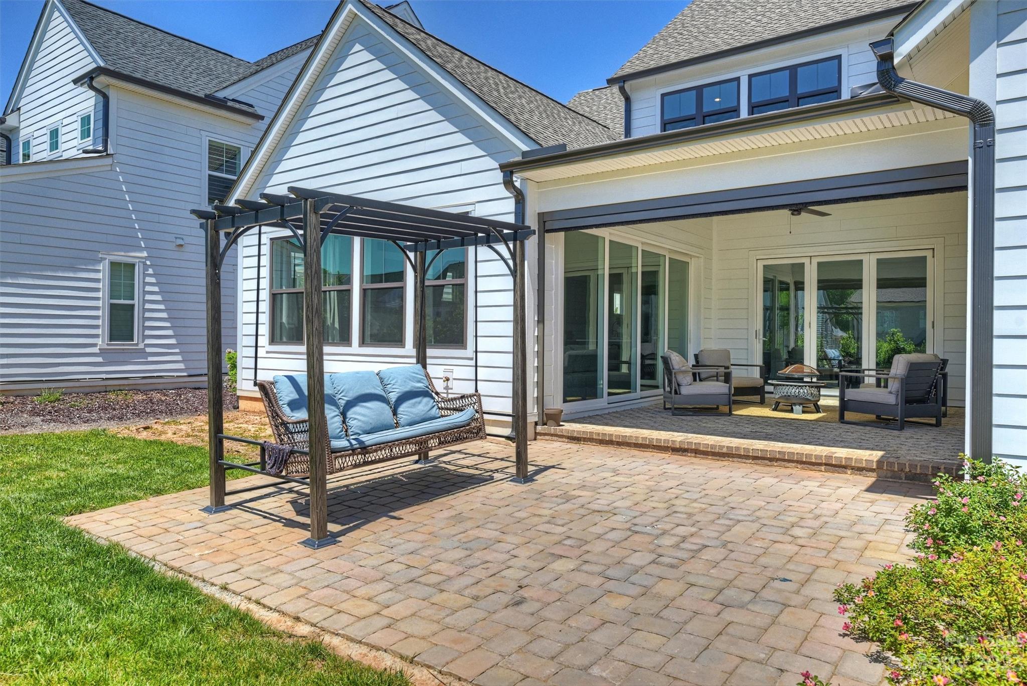 13228 Philip Michael Road Huntersville, NC 28078 - Photo 39 of 39 a view of a house with backyard porch and sitting area