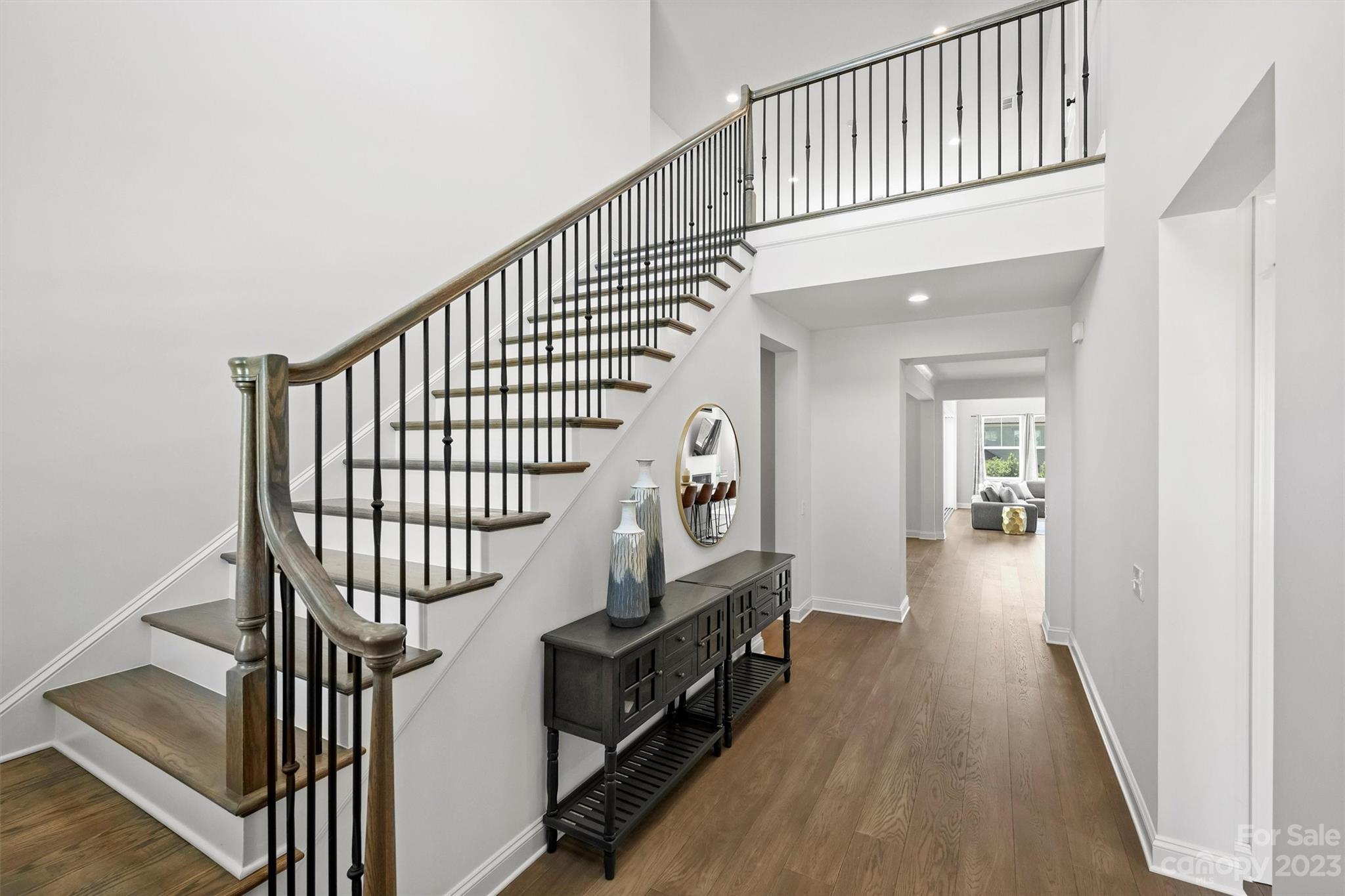 13228 Philip Michael Road Huntersville, NC 28078 - Photo 5 of 39 a view of entryway with wooden floor