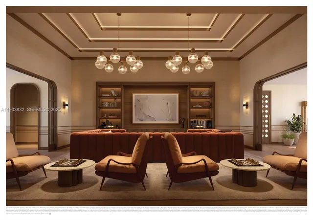 a living room with couch and a chandelier