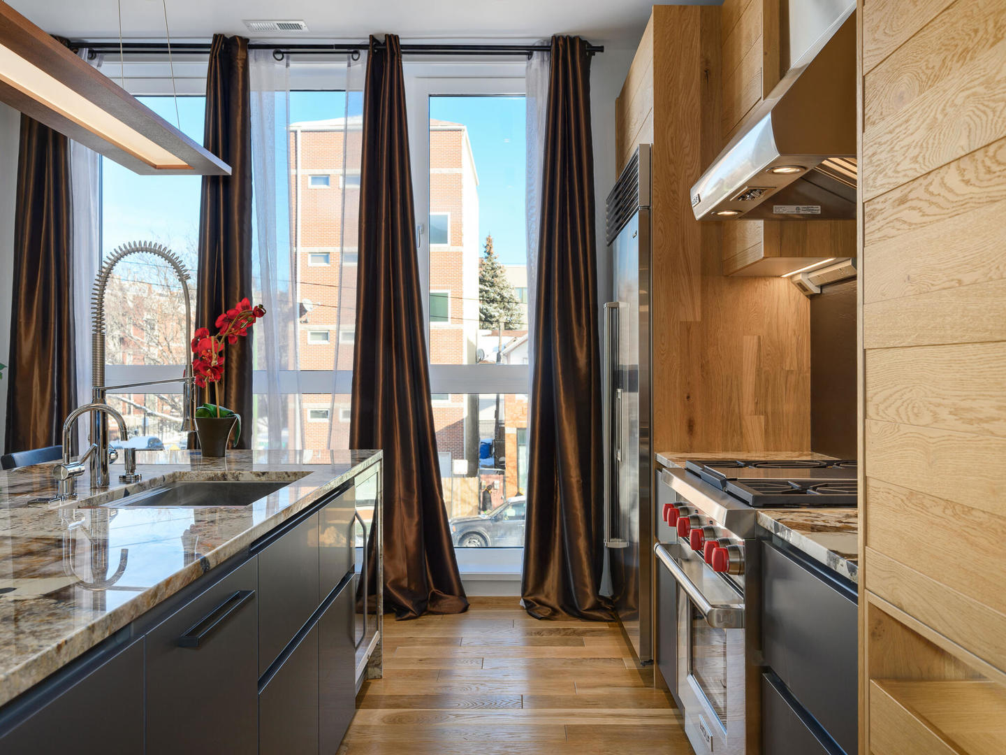 1601 West Ohio Street, Unit 2 Chicago, IL 60622 - Photo 11 of 31 a kitchen with a sink and a stove
