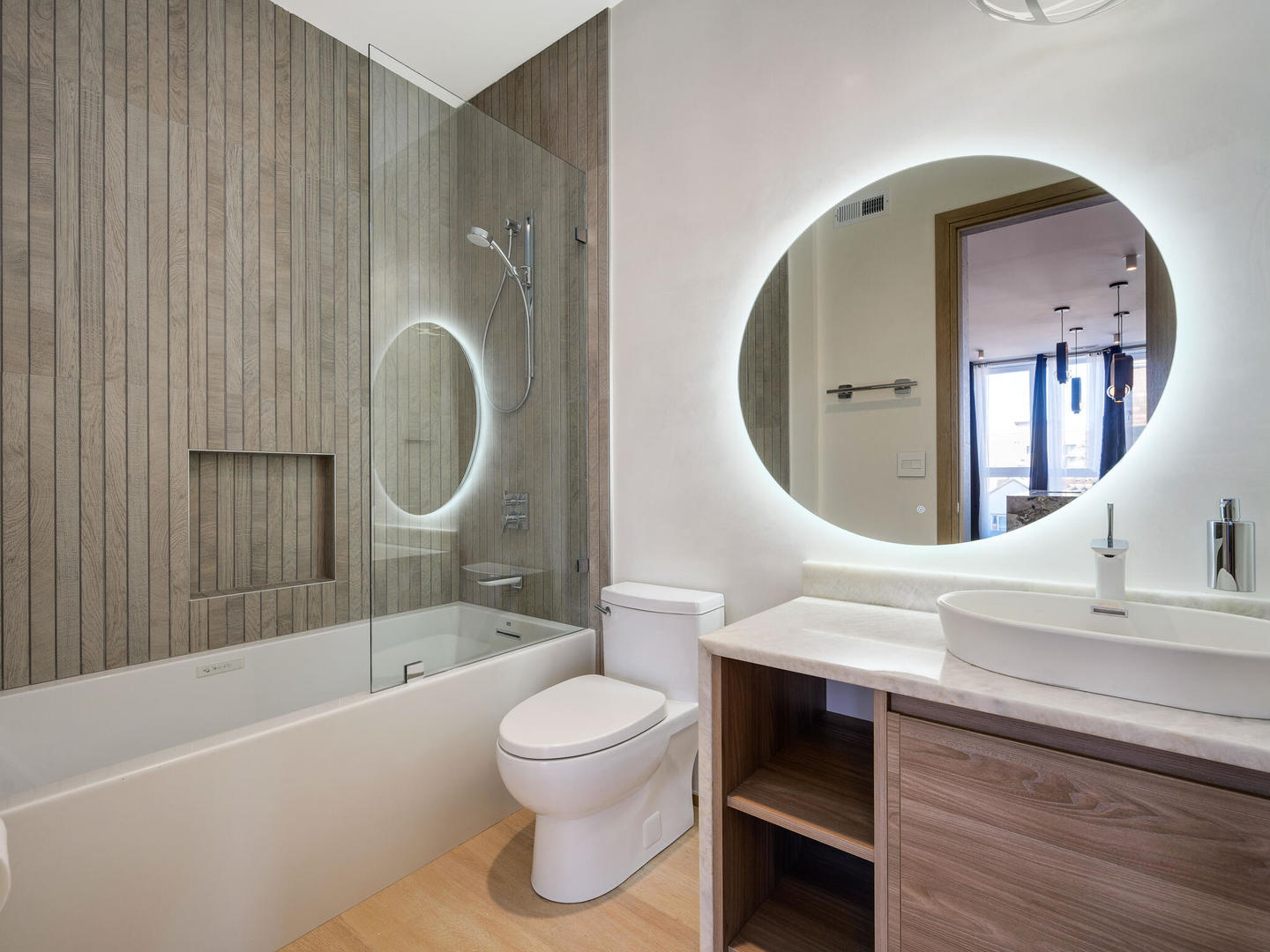 1601 West Ohio Street, Unit 2 Chicago, IL 60622 - Photo 20 of 31 a bathroom with a sink a toilet and a mirror