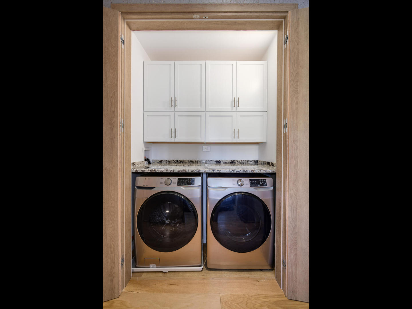 1601 West Ohio Street, Unit 2 Chicago, IL 60622 - Photo 21 of 31 a utility room with dryer and washer
