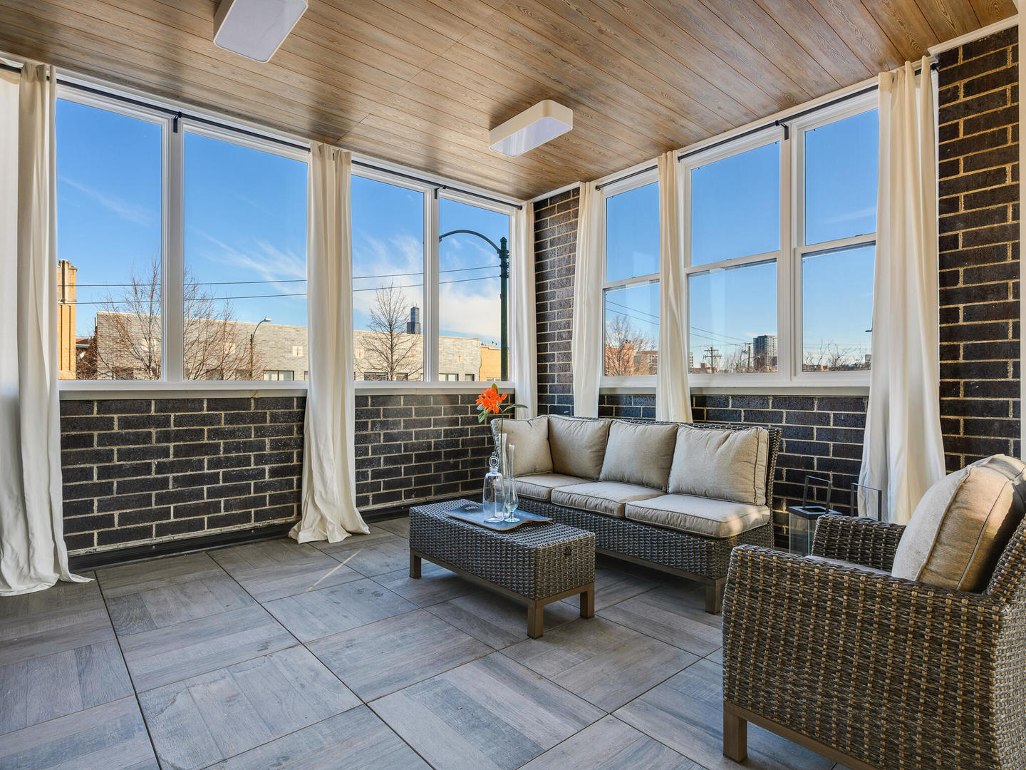 1601 West Ohio Street, Unit 2 Chicago, IL 60622 - Photo 22 of 31 a outdoor space with patio furniture and a ceiling fan