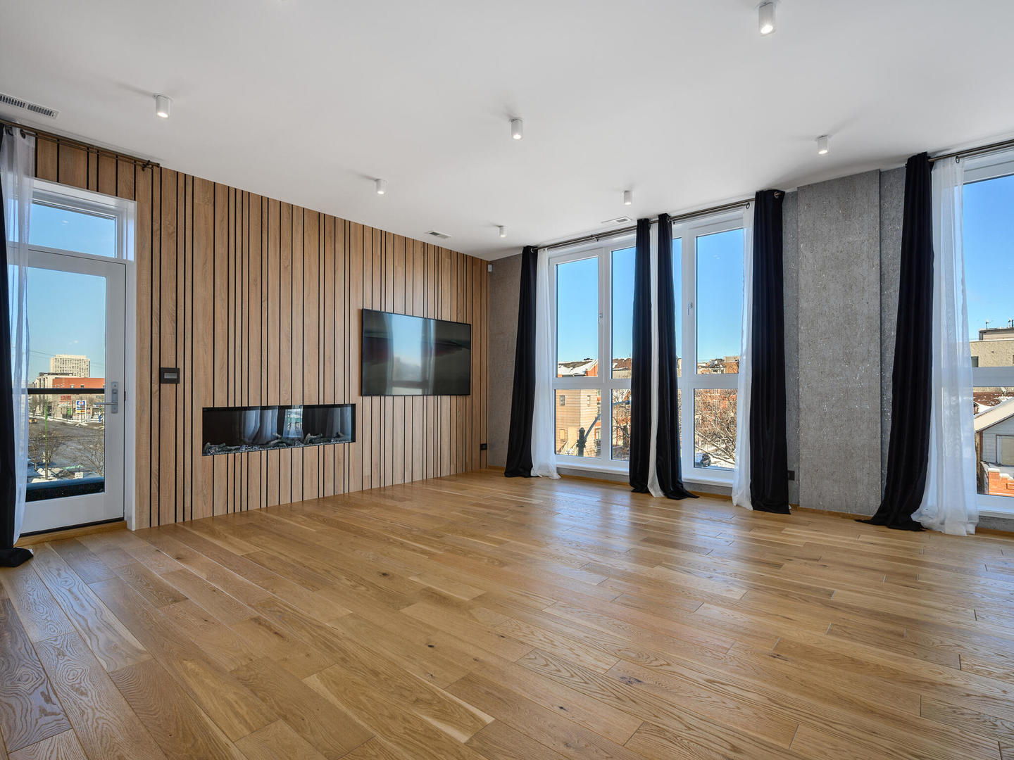1601 West Ohio Street, Unit 2 Chicago, IL 60622 - Photo 25 of 31 a view of a livingroom with wooden floor and closet