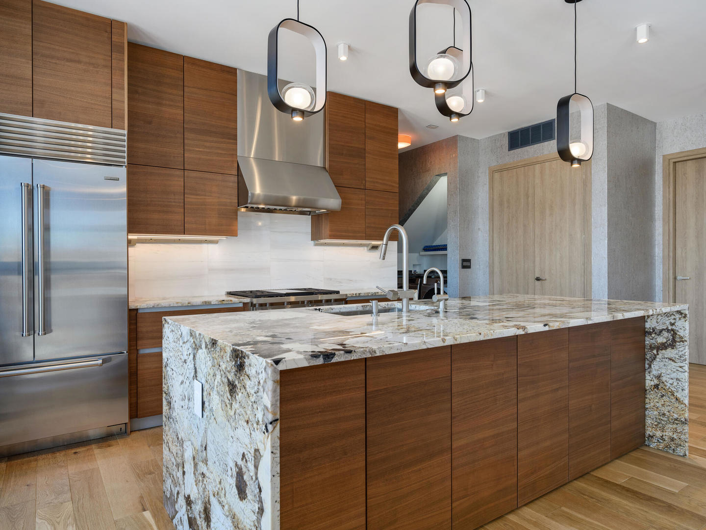 1601 West Ohio Street, Unit 2 Chicago, IL 60622 - Photo 29 of 31 a kitchen with a sink and cabinets