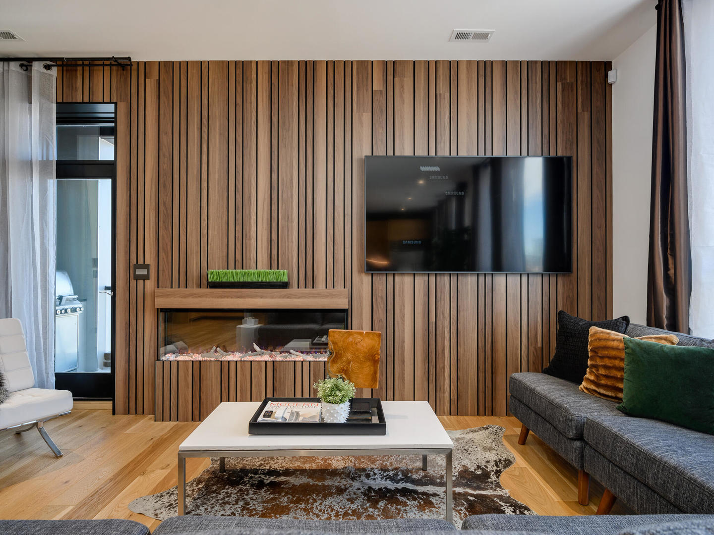 1601 West Ohio Street, Unit 2 Chicago, IL 60622 - Photo 5 of 31 a living room with a couch and a wooden floor