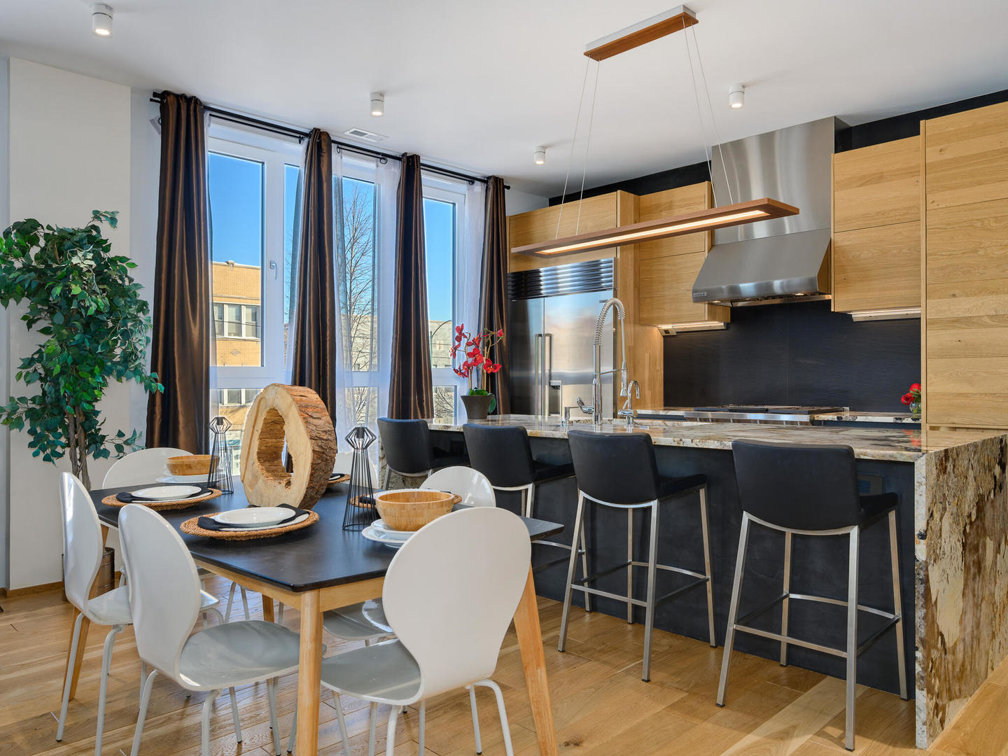 1601 West Ohio Street, Unit 2 Chicago, IL 60622 - Photo 7 of 31 a view of a dining room with furniture window and outside view