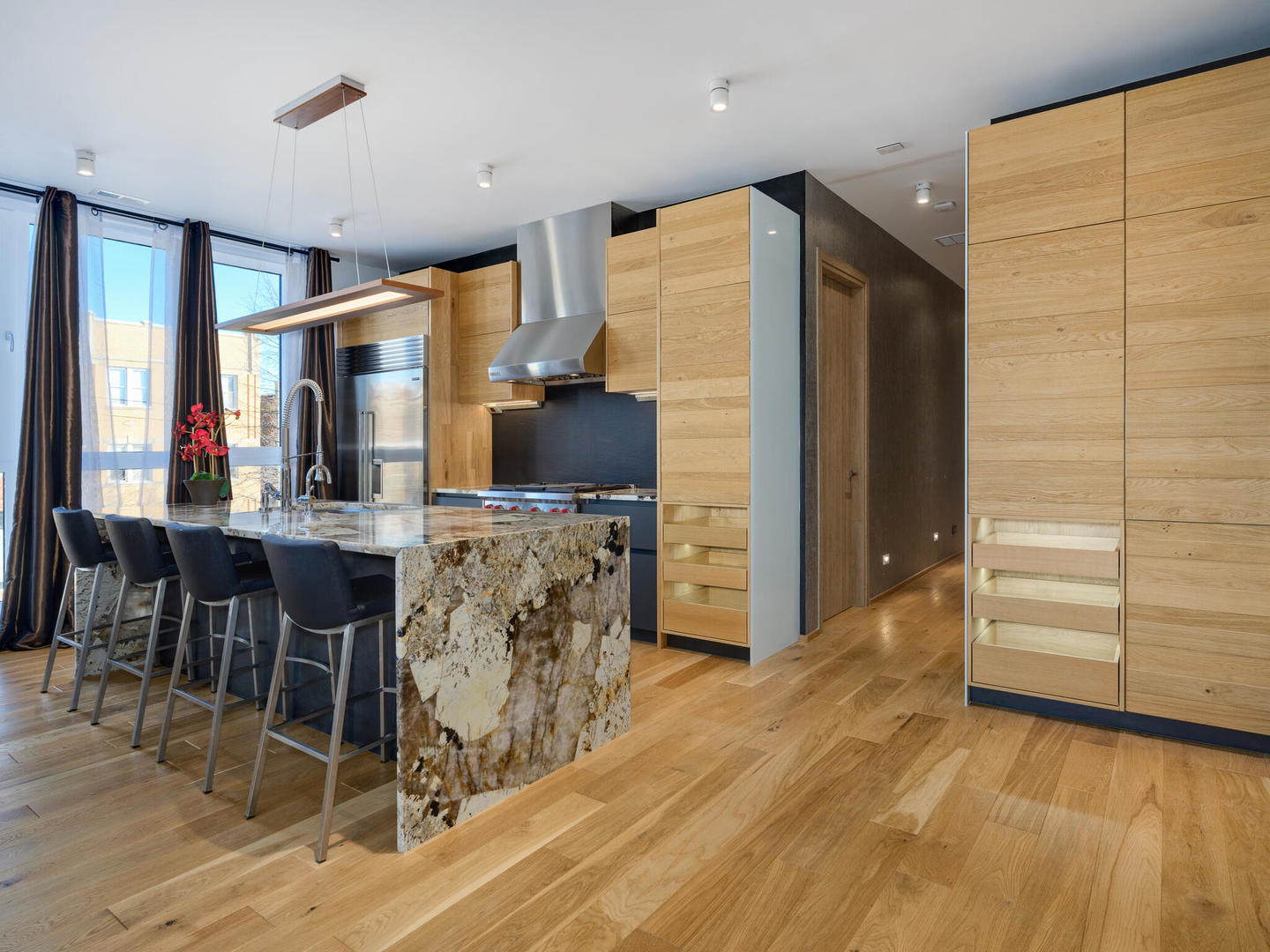 1601 West Ohio Street, Unit 2 Chicago, IL 60622 - Photo 10 of 31 a view of kitchen with furniture and wooden floor