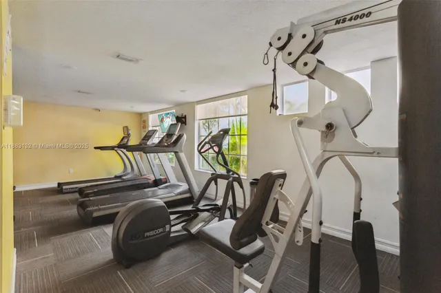 a view of a room with gym equipment
