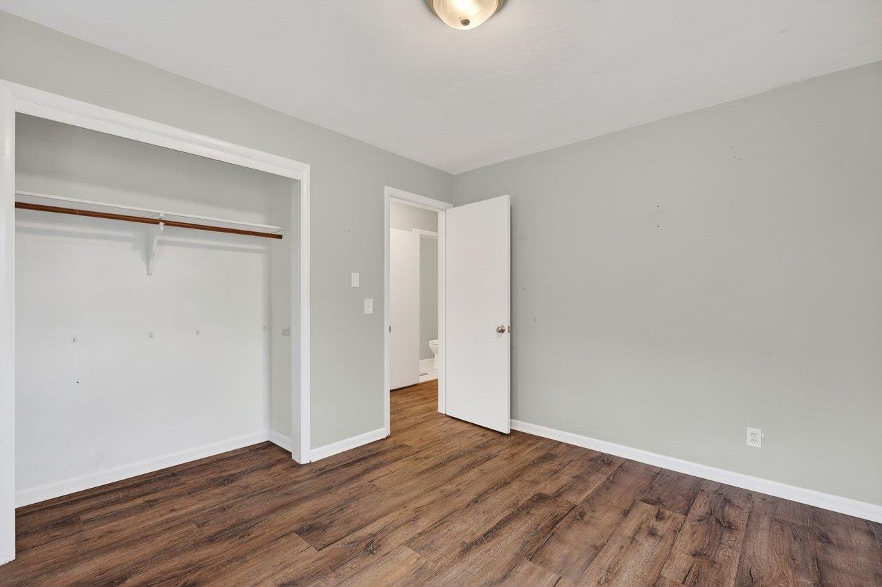 3259 Zion Church Road Broadway, VA 22815 - Photo 22 of 48 a view of an empty room with wooden floor and closet