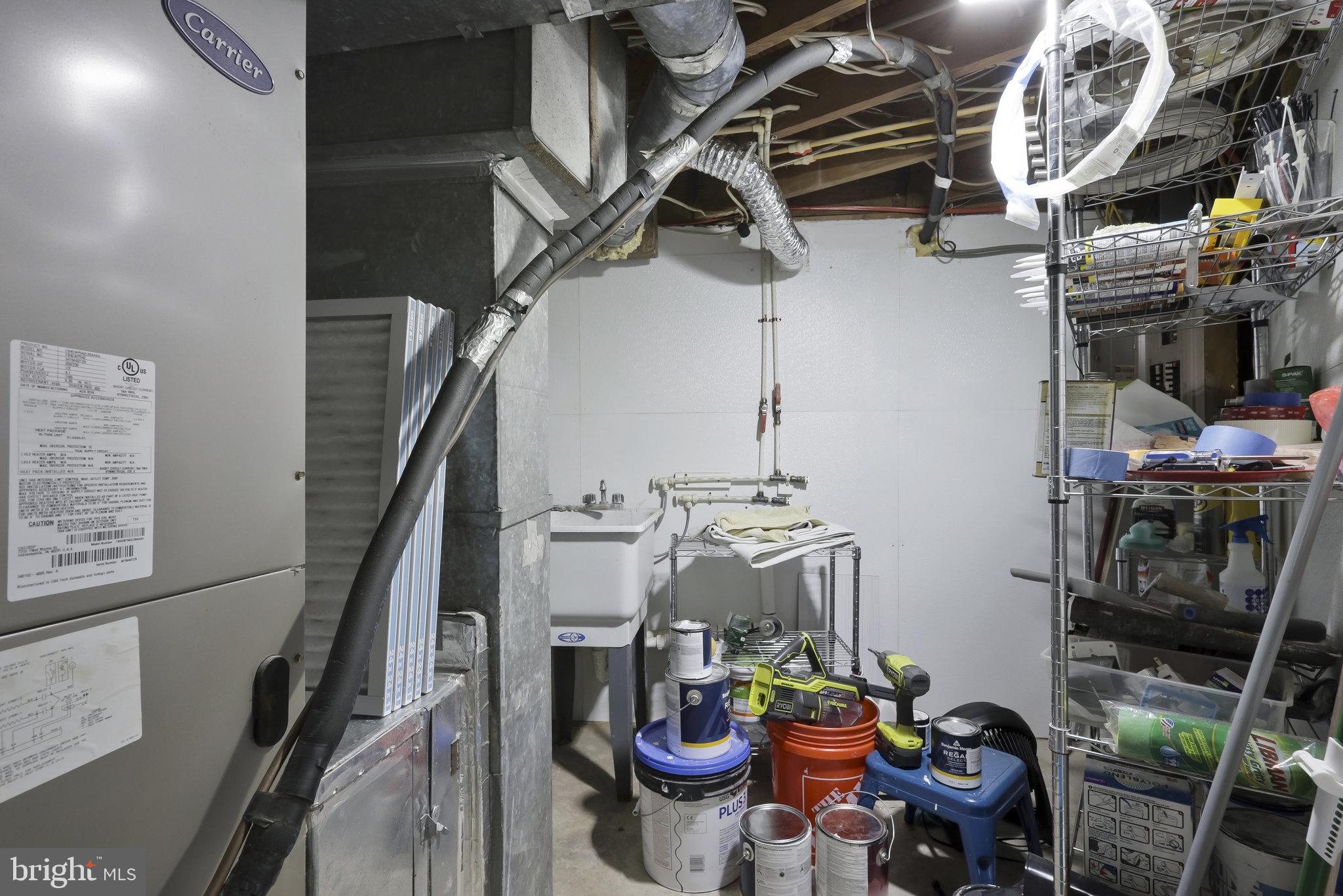 116 Commerce Street Alexandria, VA 22314 - Photo 33 of 50 Functional basement utility space.