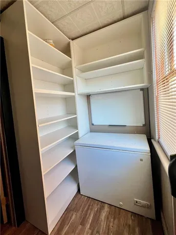a storage room with washer and dryer