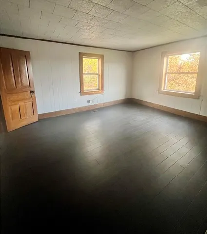 an empty room with windows