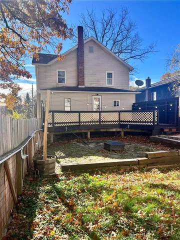 a view of a house with a large window