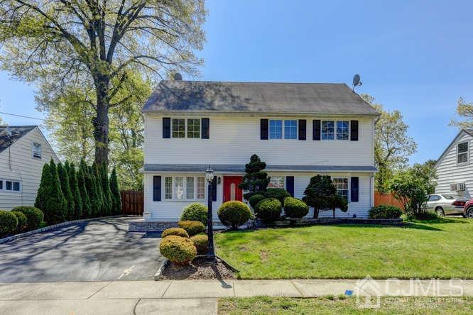 32 Ashley Road Edison, NJ 08817 - Photo 1 of 41 a view of a house with a yard