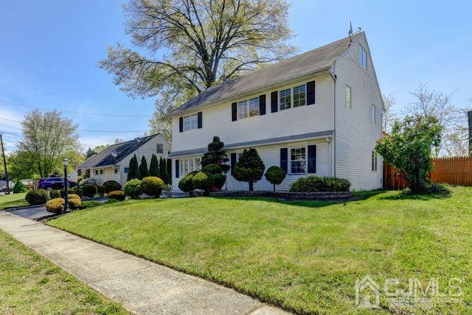 32 Ashley Road Edison, NJ 08817 - Photo 3 of 41 a view of a house with a yard and sitting area