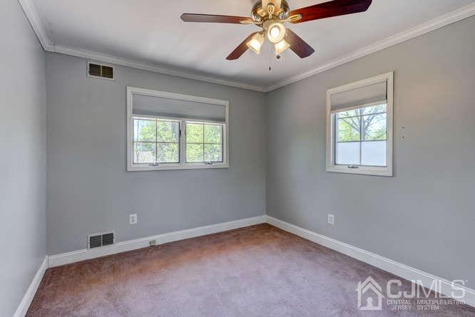 32 Ashley Road Edison, NJ 08817 - Photo 29 of 41 an empty room with a window