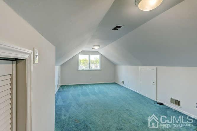 32 Ashley Road Edison, NJ 08817 - Photo 33 of 41 a view of an empty room with a window
