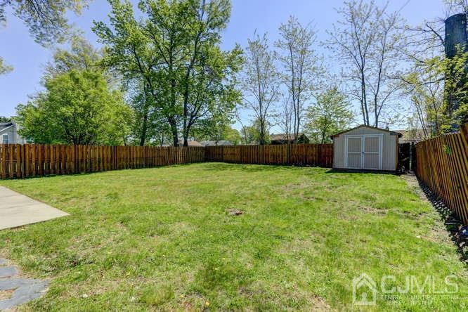 32 Ashley Road Edison, NJ 08817 - Photo 41 of 41 a view of a backyard with a garden