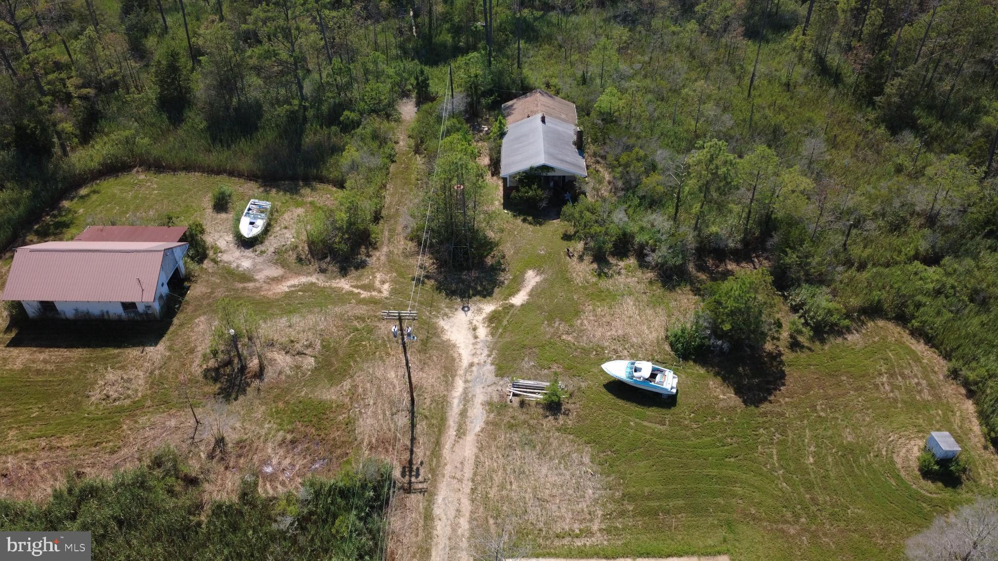 3012 William Maddox Road Crisfield, MD 21817 - Photo 18 of 20 an aerial view of a house with a yard