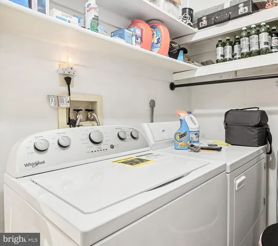 a close view of laundry room with washer and dryer