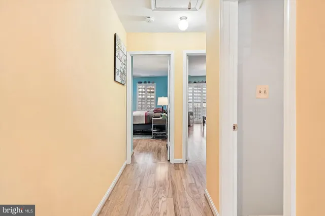 a view of a bathroom from a hallway