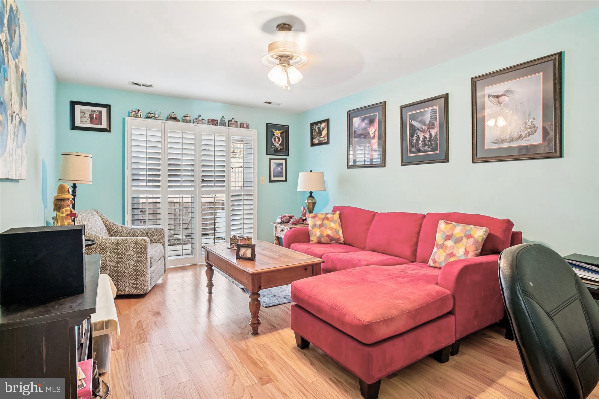 1955 Marconi Circle Annapolis, MD 21401 - Photo 10 of 17 a living room with furniture and a flat screen tv