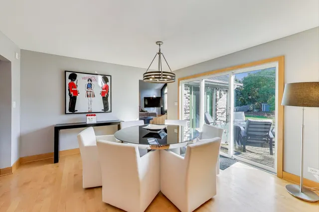 a living room with fireplace furniture and a flat screen tv
