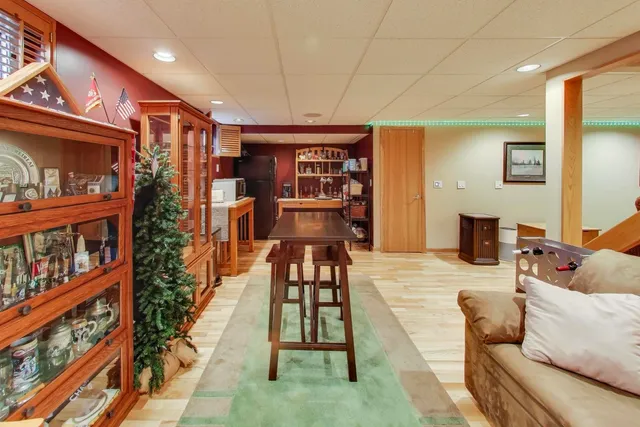 a bedroom with a bed and a cabinets