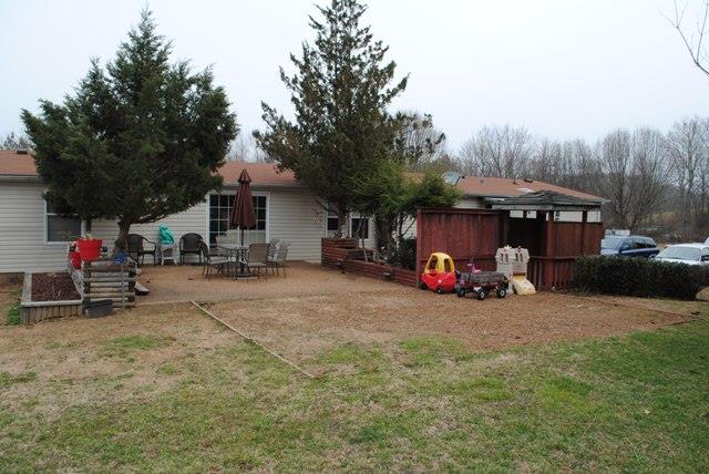 1000 Kaity Brooke Road Portland, TN 37148 - Photo 4 of 19 a view of a outdoor space with patio and sitting area