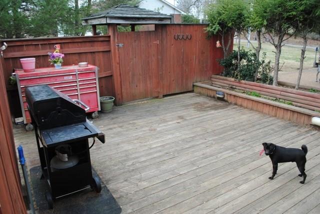 1000 Kaity Brooke Road Portland, TN 37148 - Photo 6 of 19 a backyard of a house with wooden floor and outdoor seating