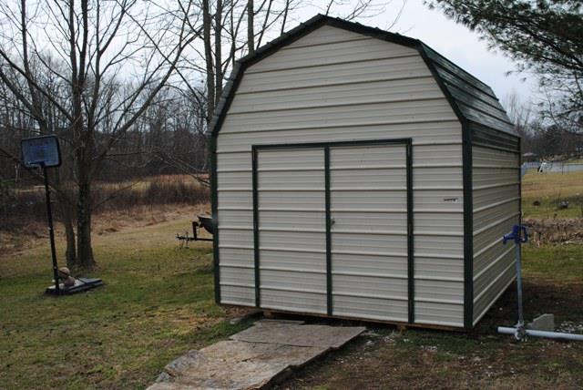 1000 Kaity Brooke Road Portland, TN 37148 - Photo 7 of 19 a view of a small house
